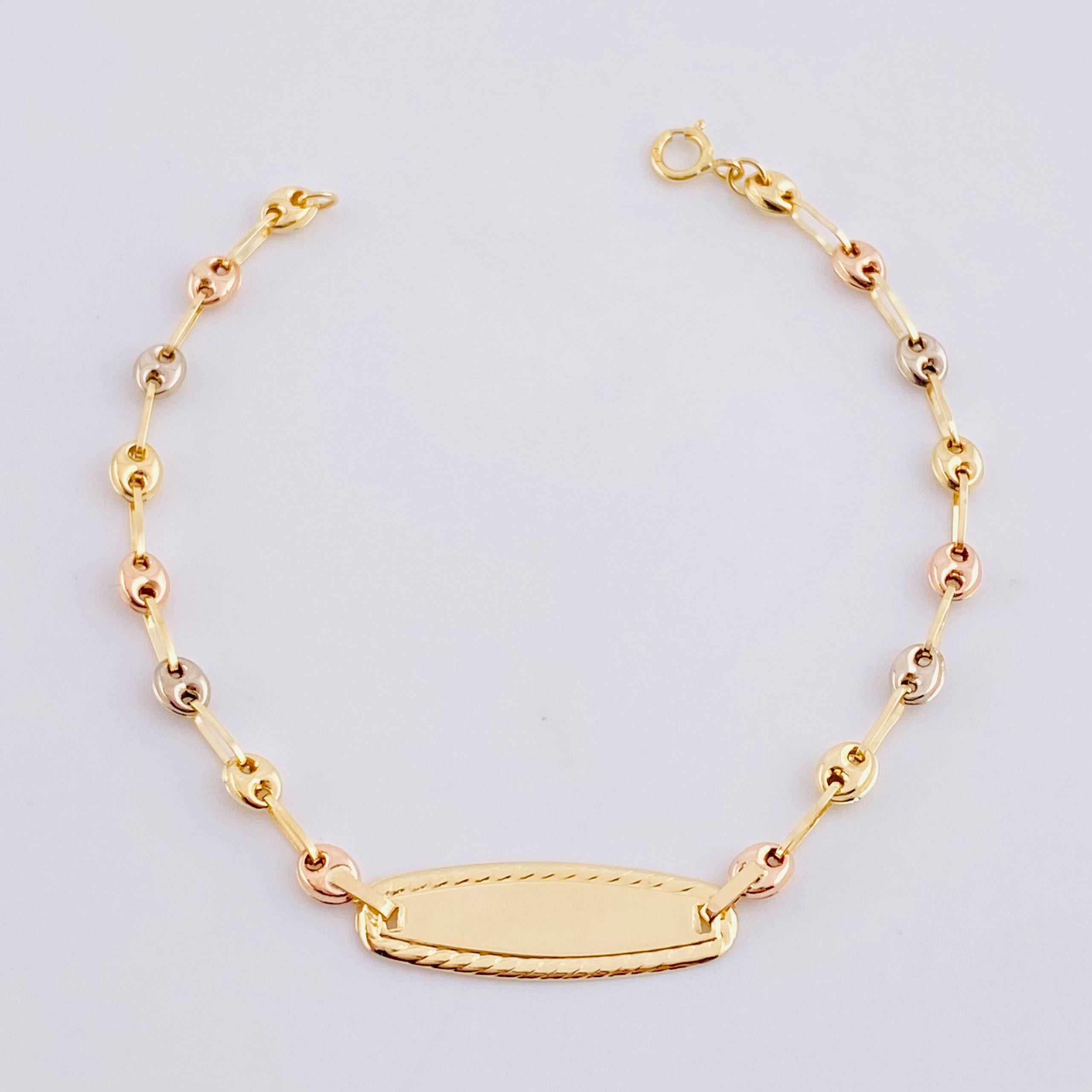 Pulso Bebé GC Placa Ovalada Bordeada 1.65g / 15cm / 3.3mm Tres Oros 18K