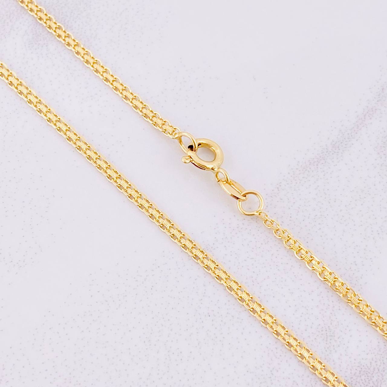 Cadena China 5.5g / 60cm / 2.1mm Oro Amarillo 18K