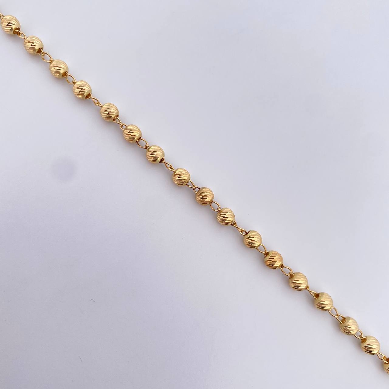 Pulso Tipo Militar Espiga 3.1gr / 19.2cm / 4mm Bolas Diamanatadas Oro Amarillo 18K $