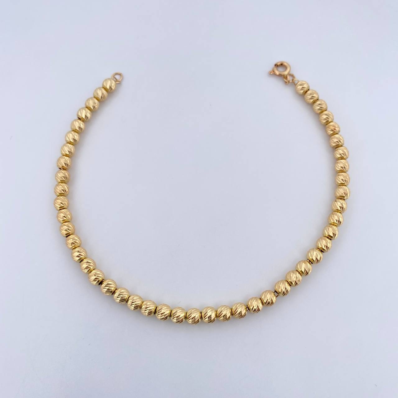 Pulso Tipo Militar 4.65gr / 19.4cm / 4mm Bolas Diamantadas Oro Amarillo 18K &