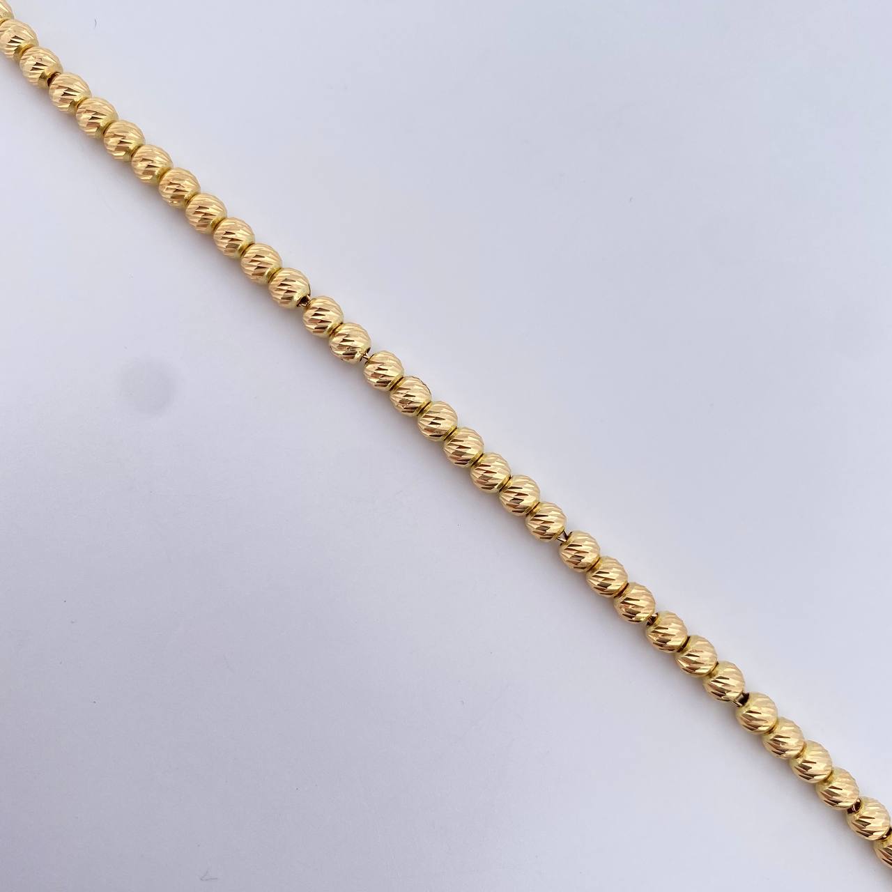 Pulso Tipo Militar 4.65gr / 19.4cm / 4mm Bolas Diamantadas Oro Amarillo 18K &