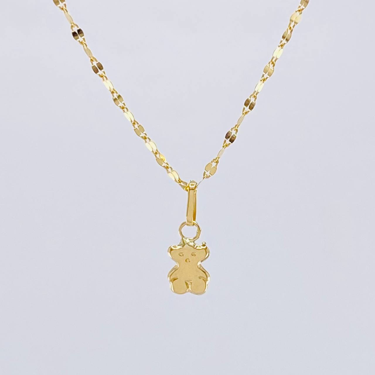 Set Cadena Flor Espejo + Dije Oso Ts / 1.25gr / 45.3 cm Oro Amarillo 18K