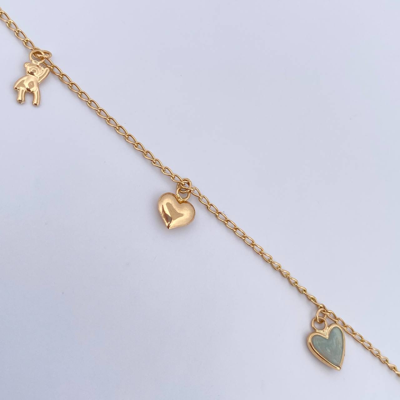 Pulso Espiga  2.7gr / 18.6cm / 1.4mm Dijes Corazones Osos Oro Amarillo 18K $