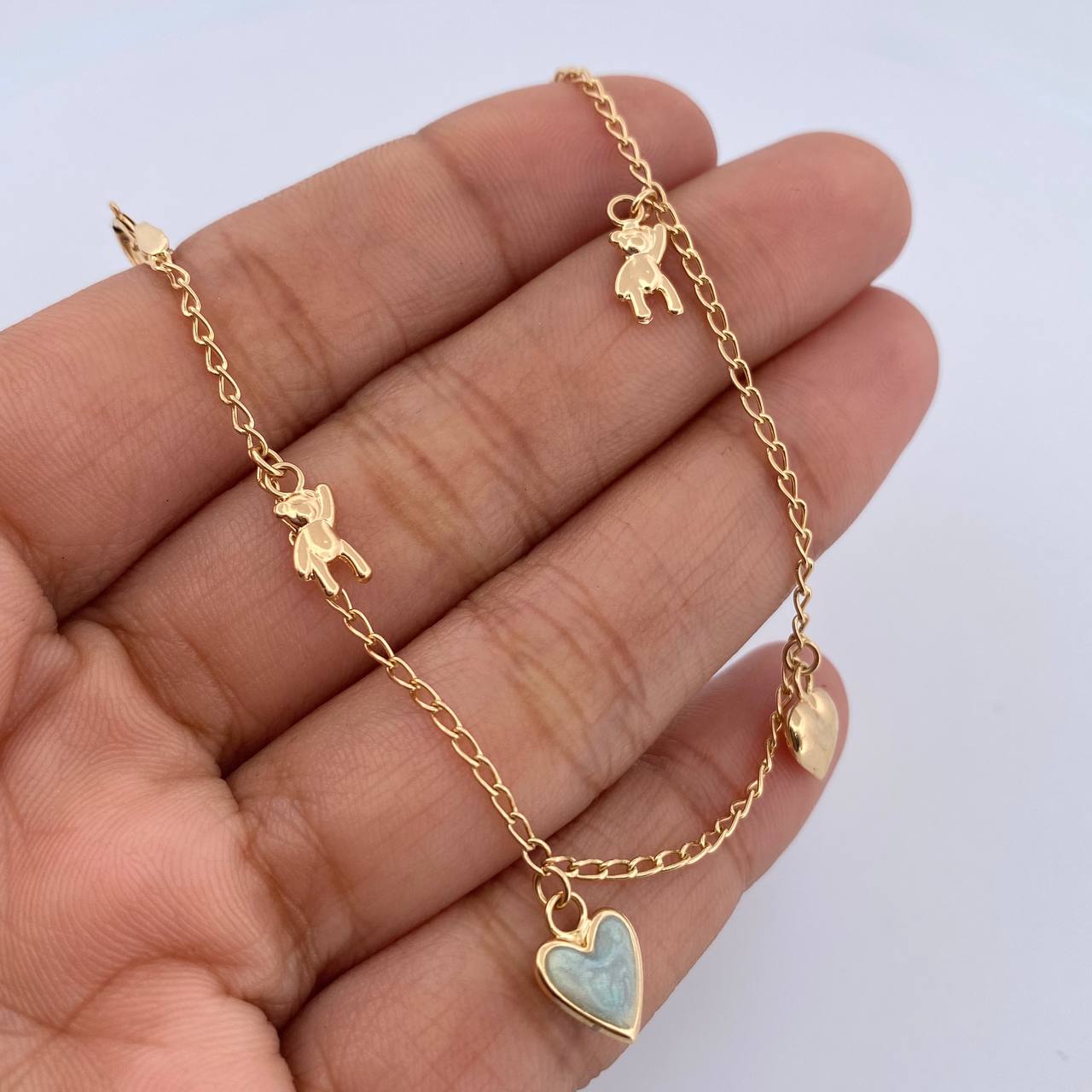 Pulso Espiga  2.7gr / 18.6cm / 1.4mm Dijes Corazones Osos Oro Amarillo 18K $
