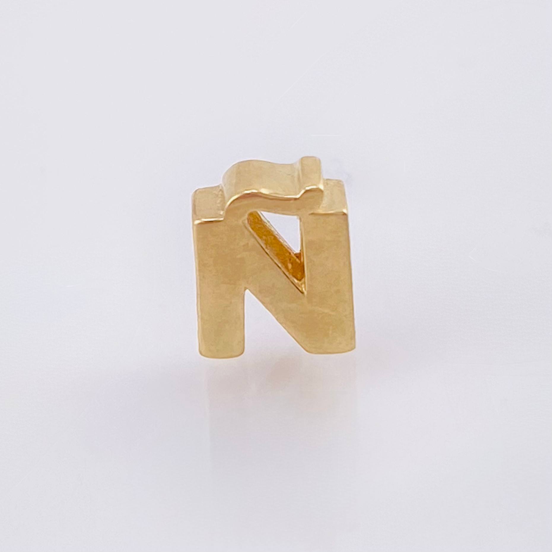 Herraje Tambor Letra Ñ 0.5gr / 7mm Oro Amarillo 18K