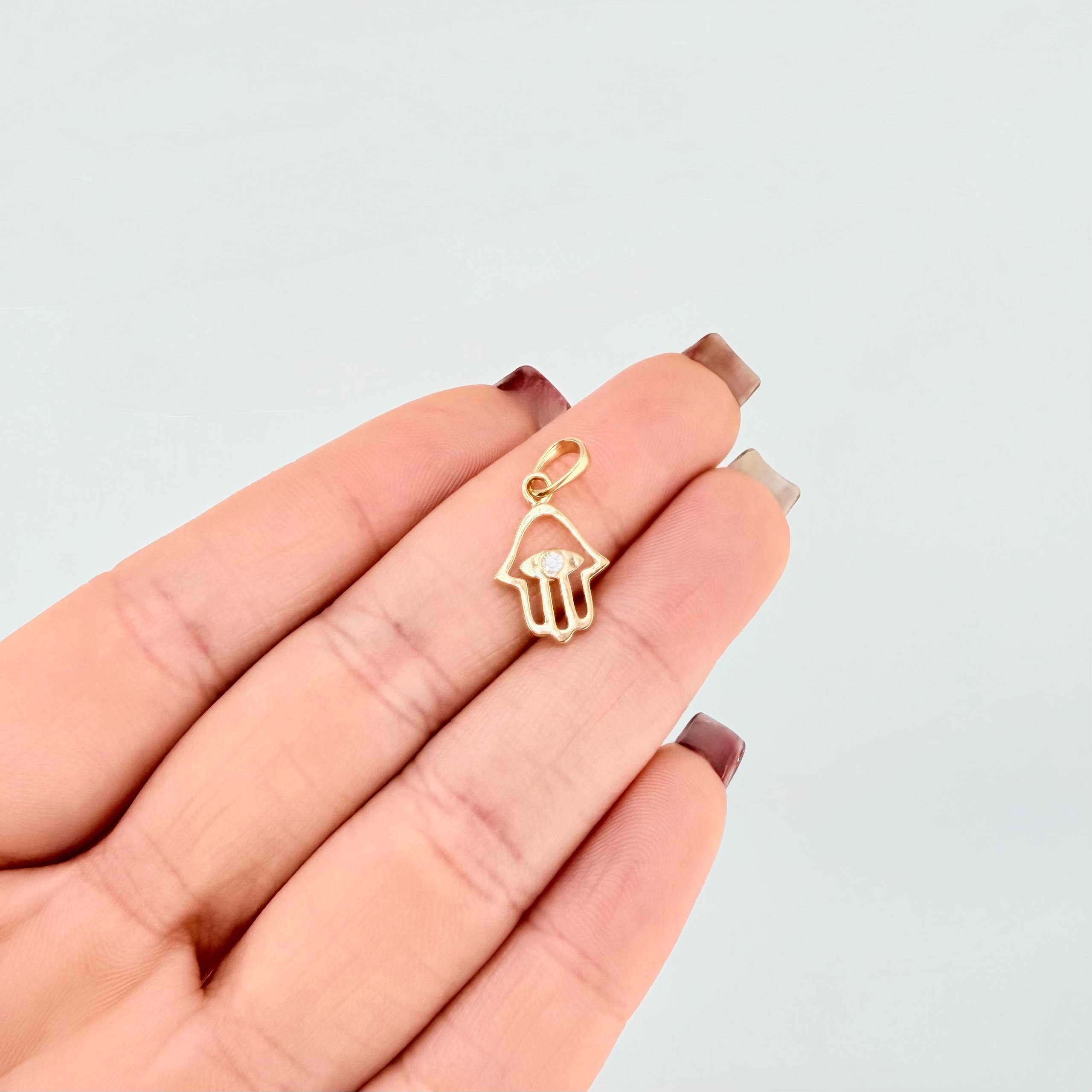 Dije Mano Hamsa 0.95gr / 2cm / Oro Amarillo 18K