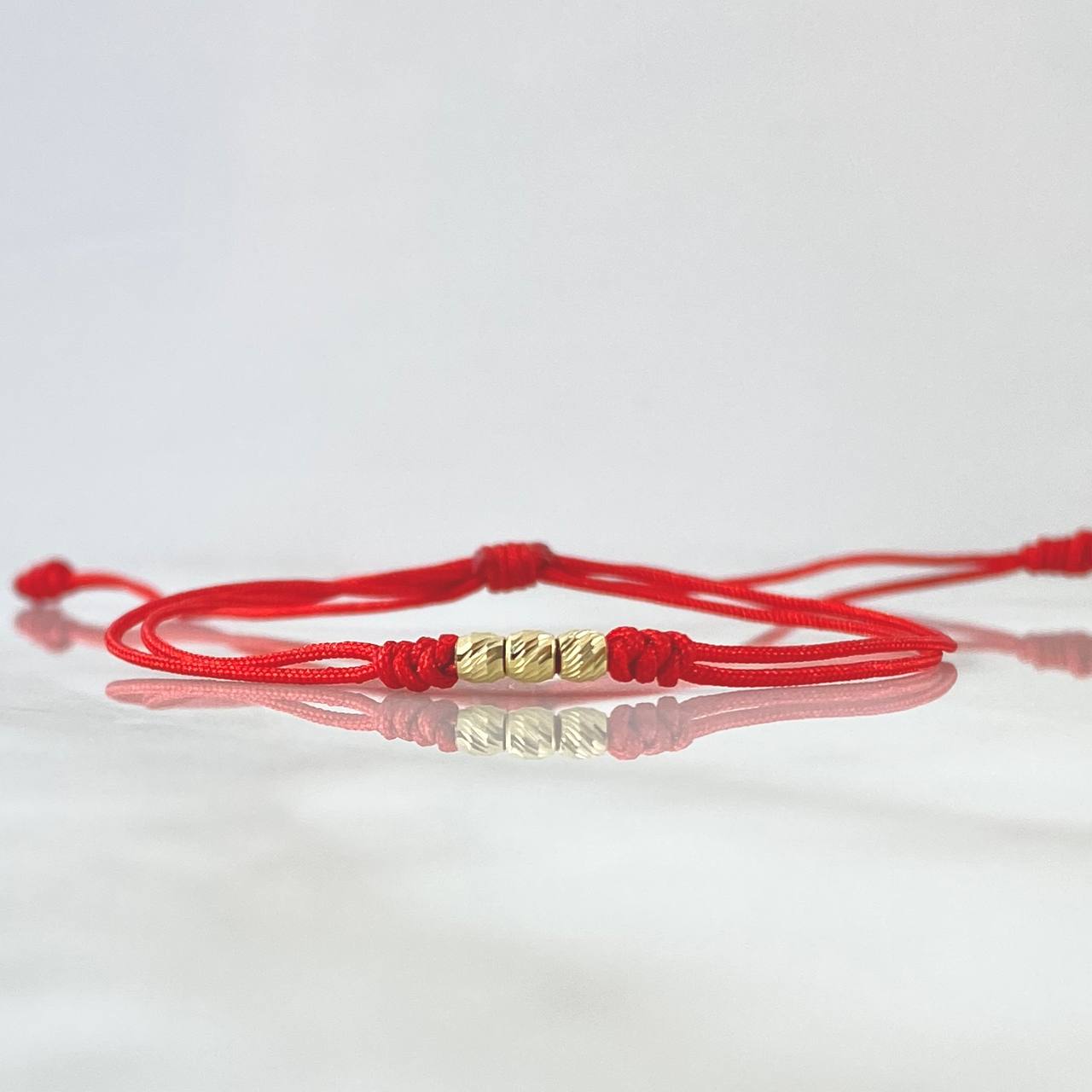 Pulsera Roja Tres Promesas 0.25gr / 3mm Bolas Diamantadas 3und Oro Amarillo 18K *