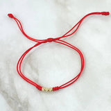 Pulsera Roja Tres Promesas 0.25gr / 3mm Bolas Diamantadas 3und Oro Amarillo 18K