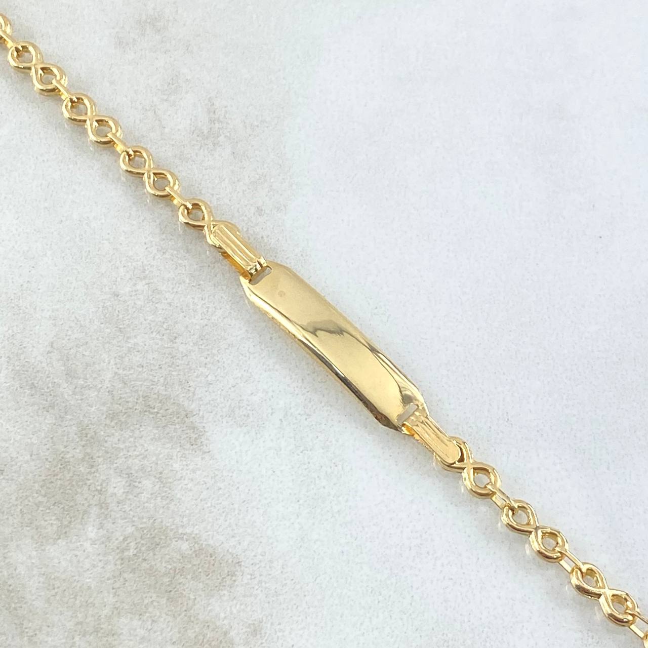 Pulso Bebé Infinito Placa Rectangular  1.8gr / 15cm-3.3mm Liso Oro Amarillo 18K