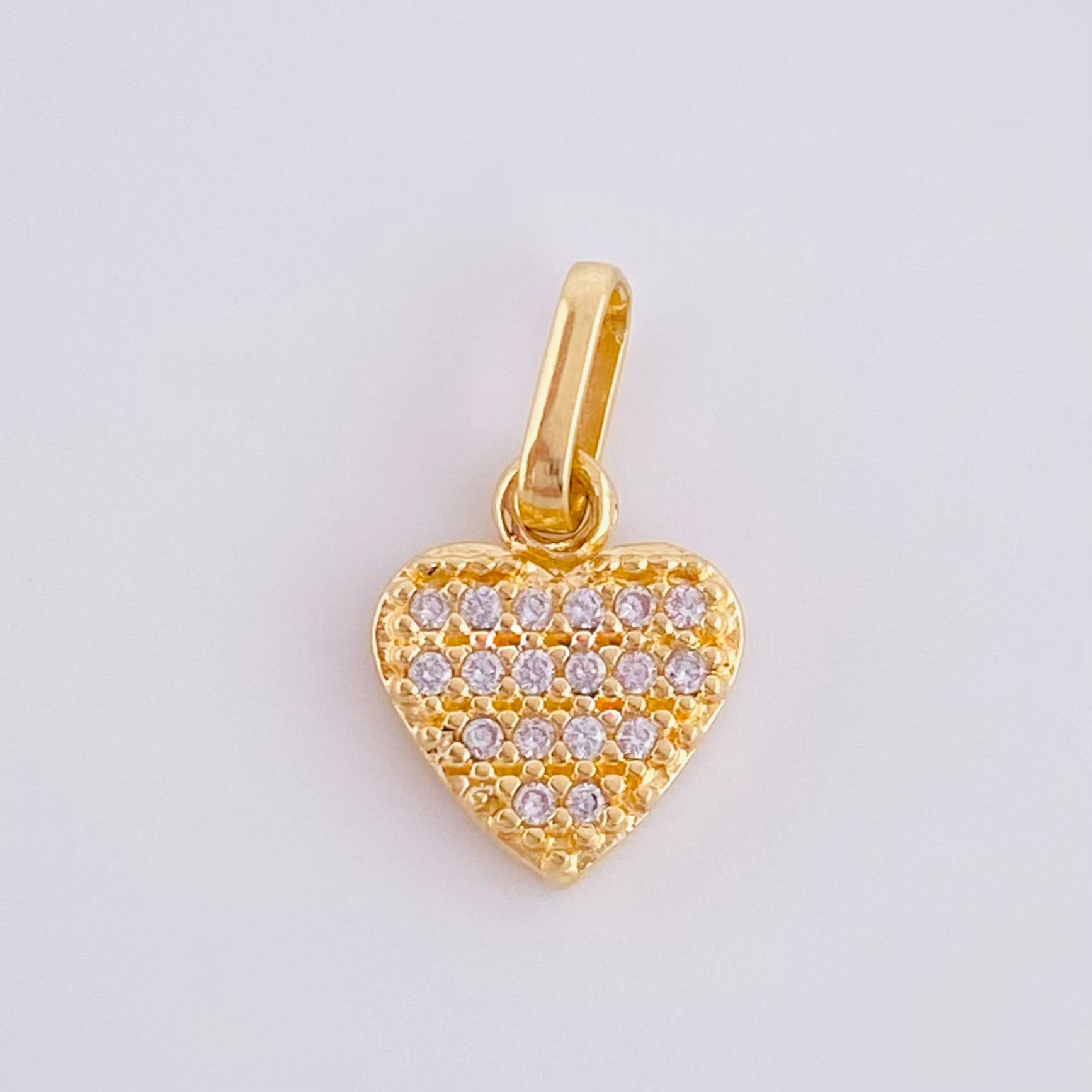 Dije Corazon Tupido 0.95gr / 1.5cm / Oro Amarillo 18K *