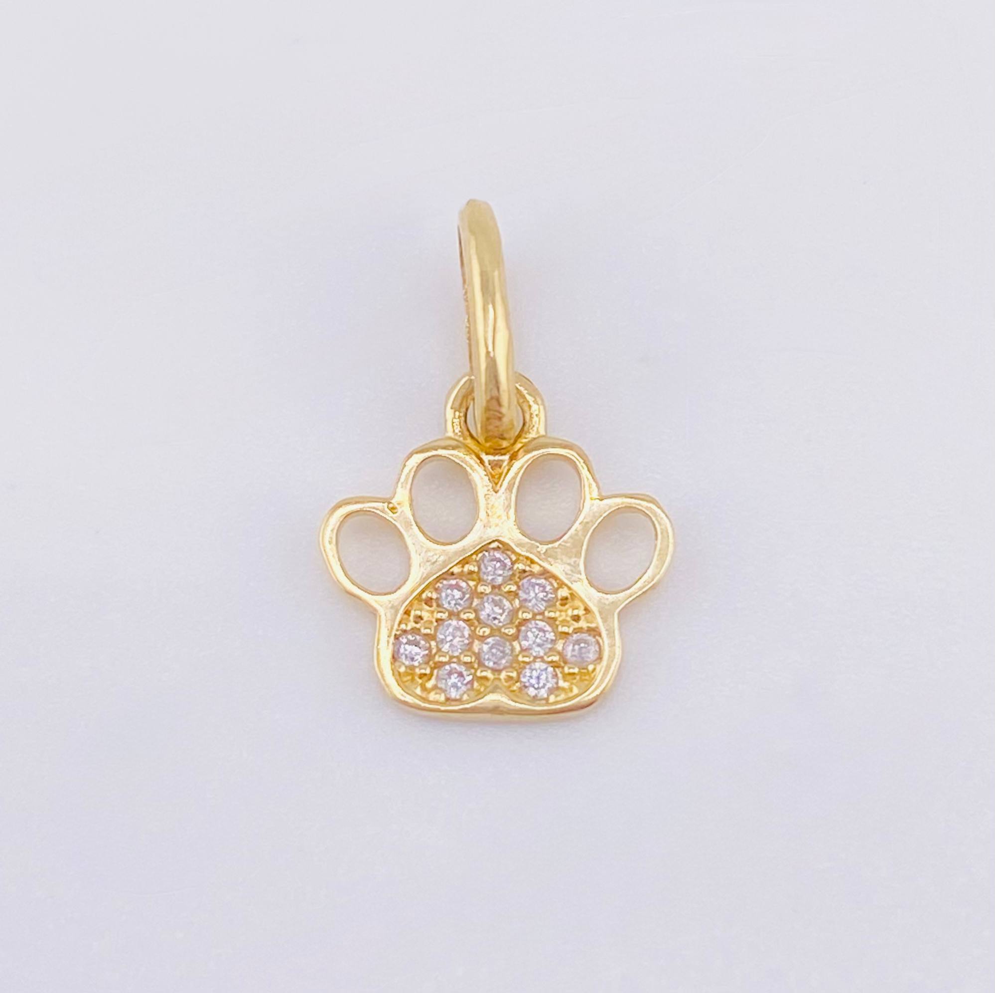 Dije Huella 0.65gr / 1.5cm / Oro Amarillo 18K