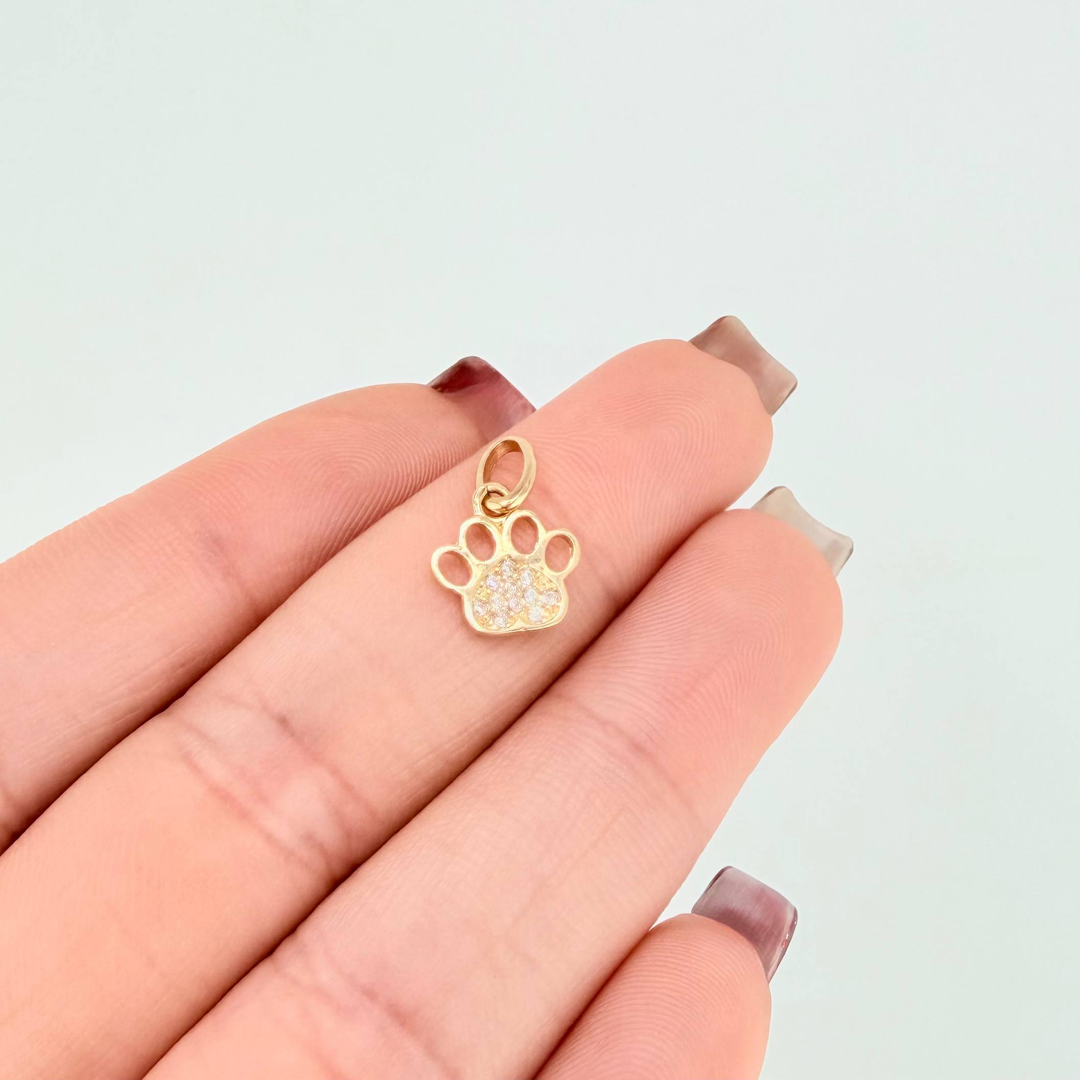 Dije Huella 0.65gr / 1.5cm / Oro Amarillo 18K