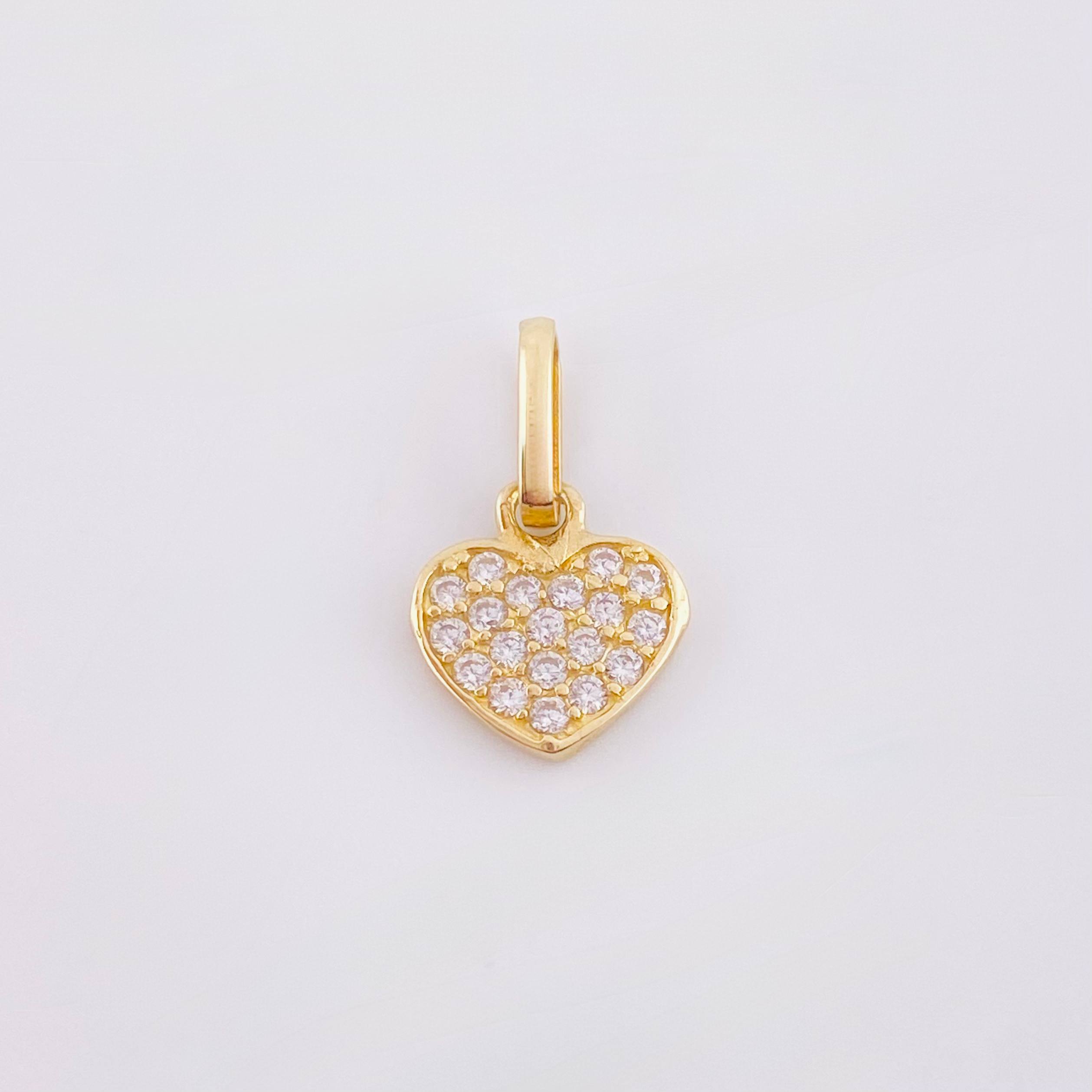 Dije Corazon Tupido 0.7gr / 1.5cm / Oro Amarillo 18K