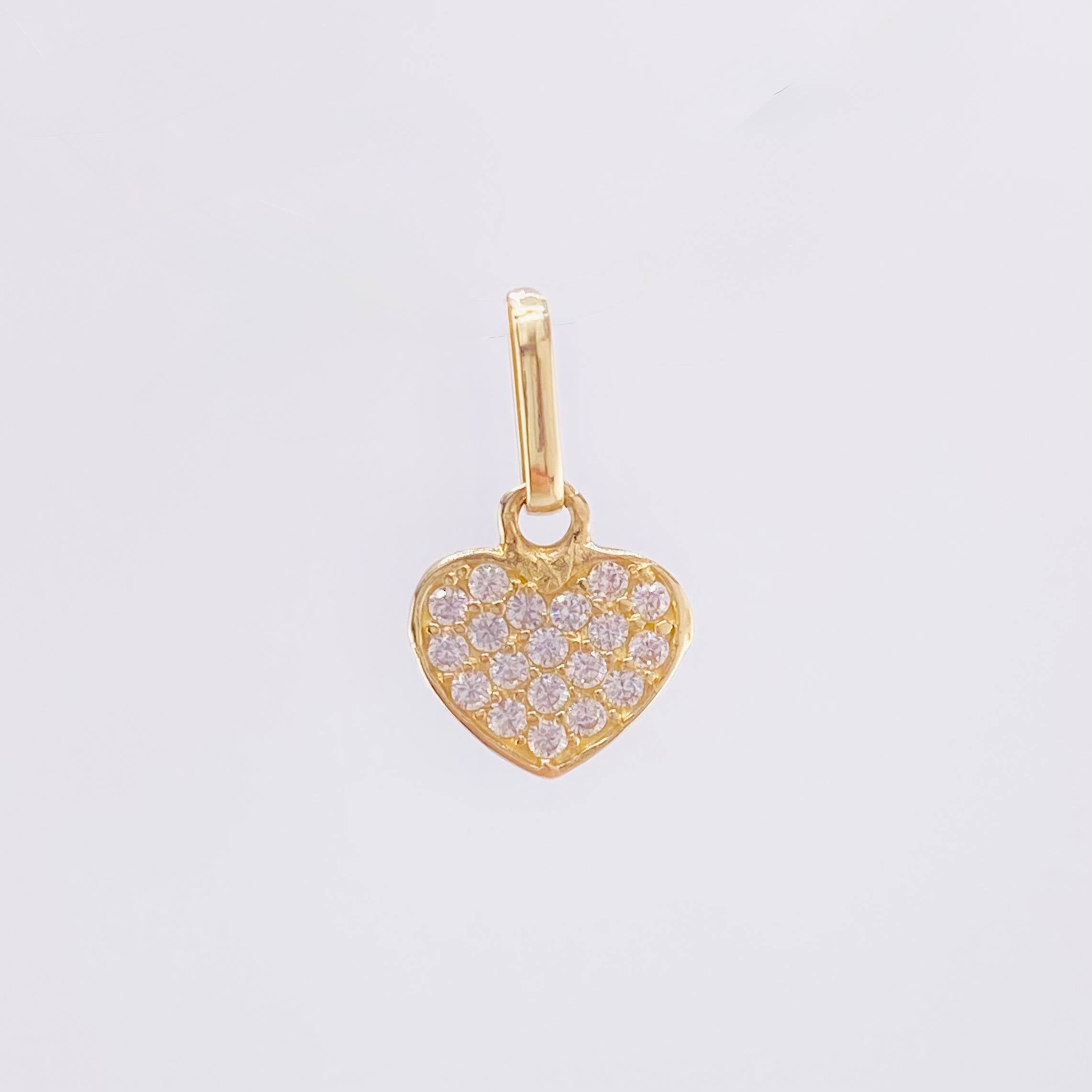 Dije Corazon Tupido 0.7gr / 1.5cm / Oro Amarillo 18K