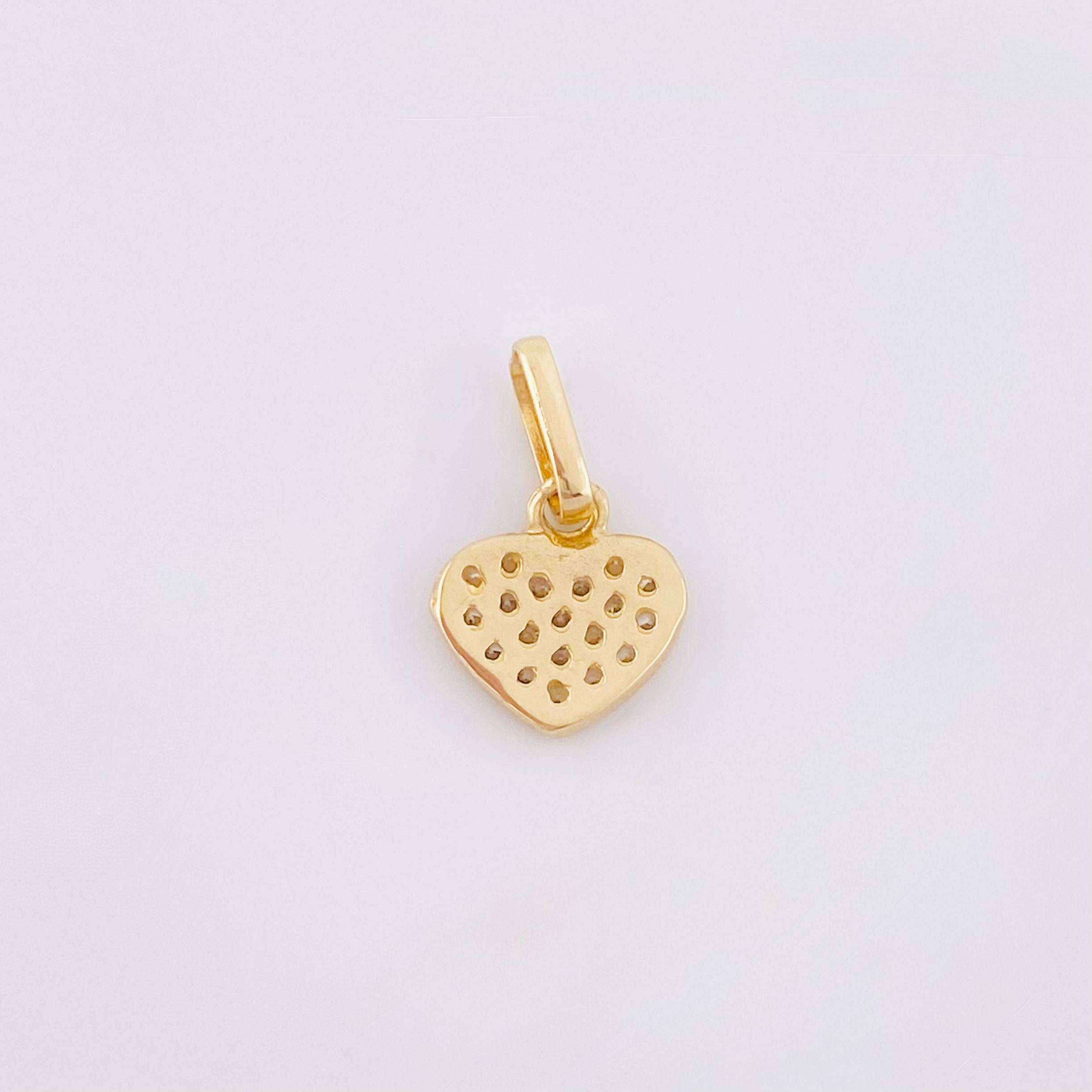 Dije Corazon Tupido 0.7gr / 1.5cm / Oro Amarillo 18K