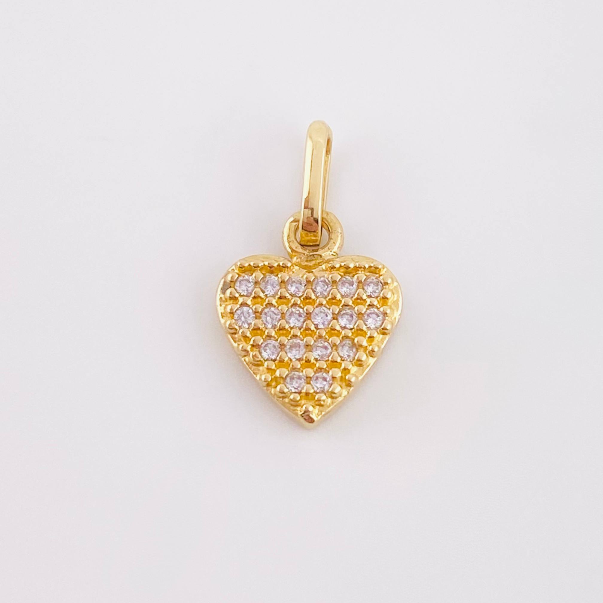 Dije Corazon Tupido 0.9gr / 1.5cm / Oro Amarillo 18K ©