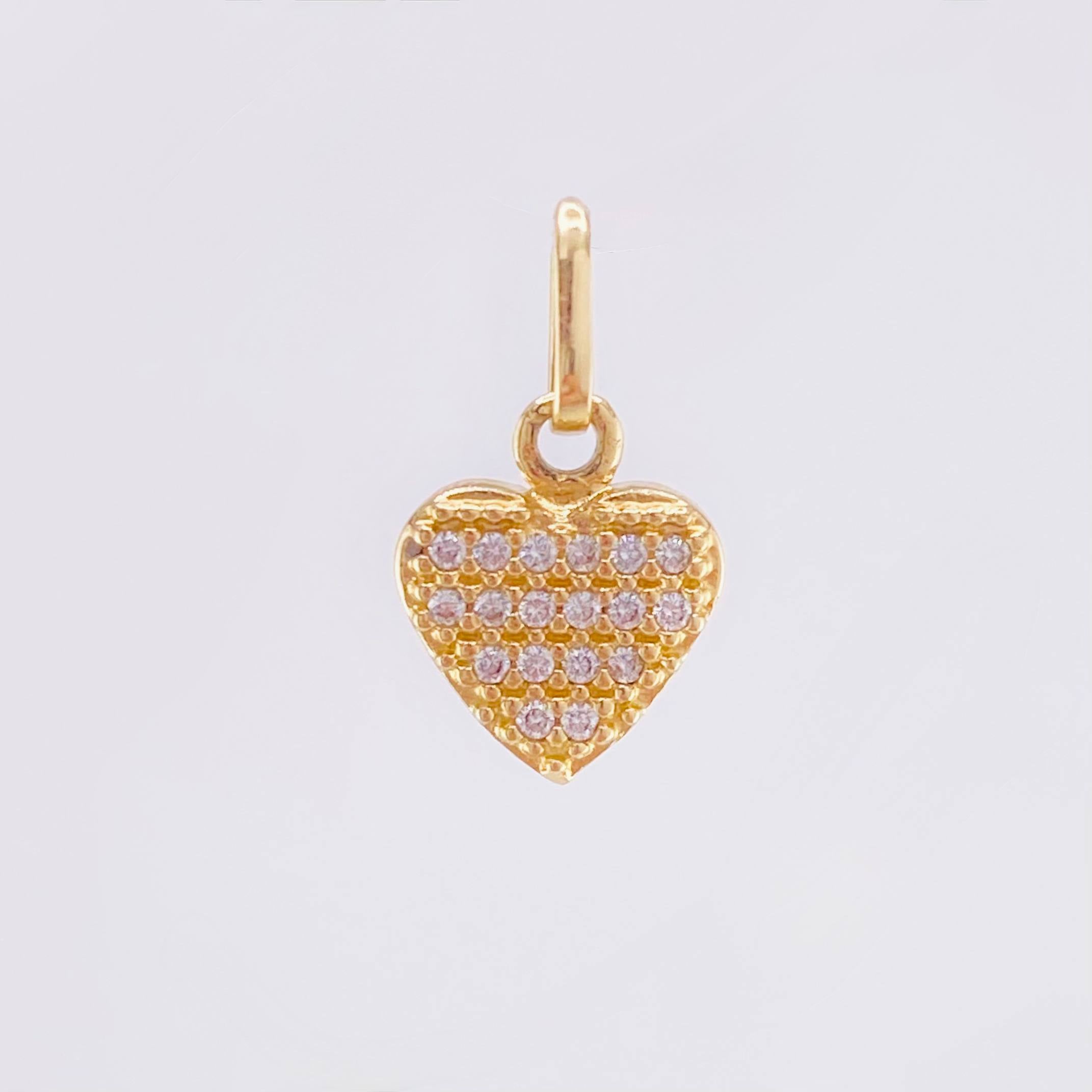 Dije Corazon Tupido 0.9gr / 1.5cm / Oro Amarillo 18K ©
