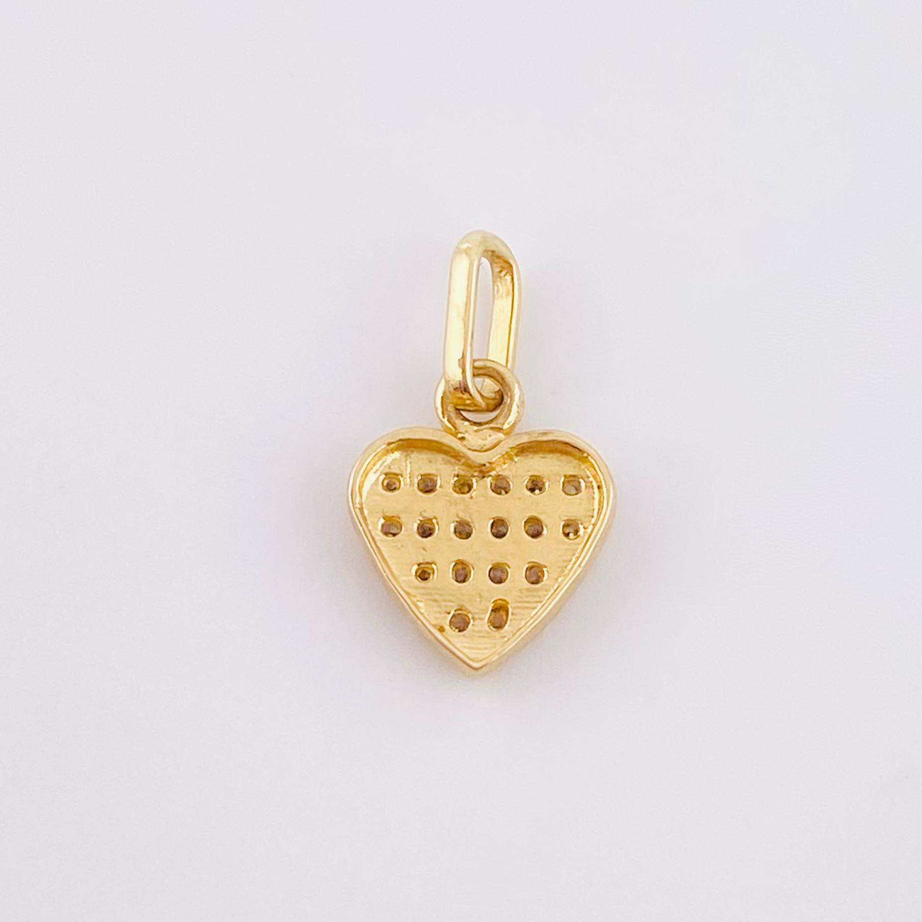 Dije Corazon Tupido 0.9gr / 1.5cm / Oro Amarillo 18K ©