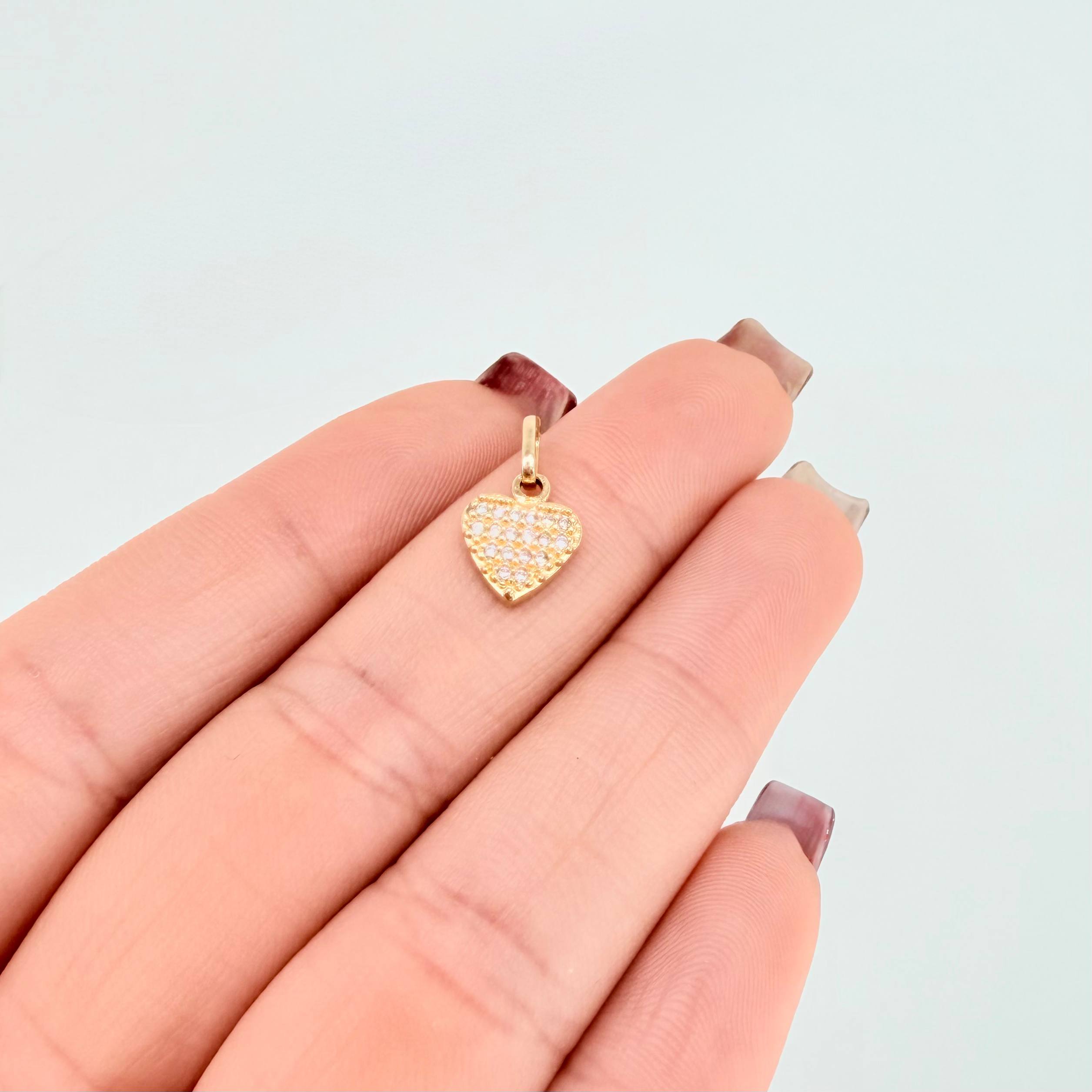 Dije Corazon Tupido 0.9gr / 1.5cm / Oro Amarillo 18K ©