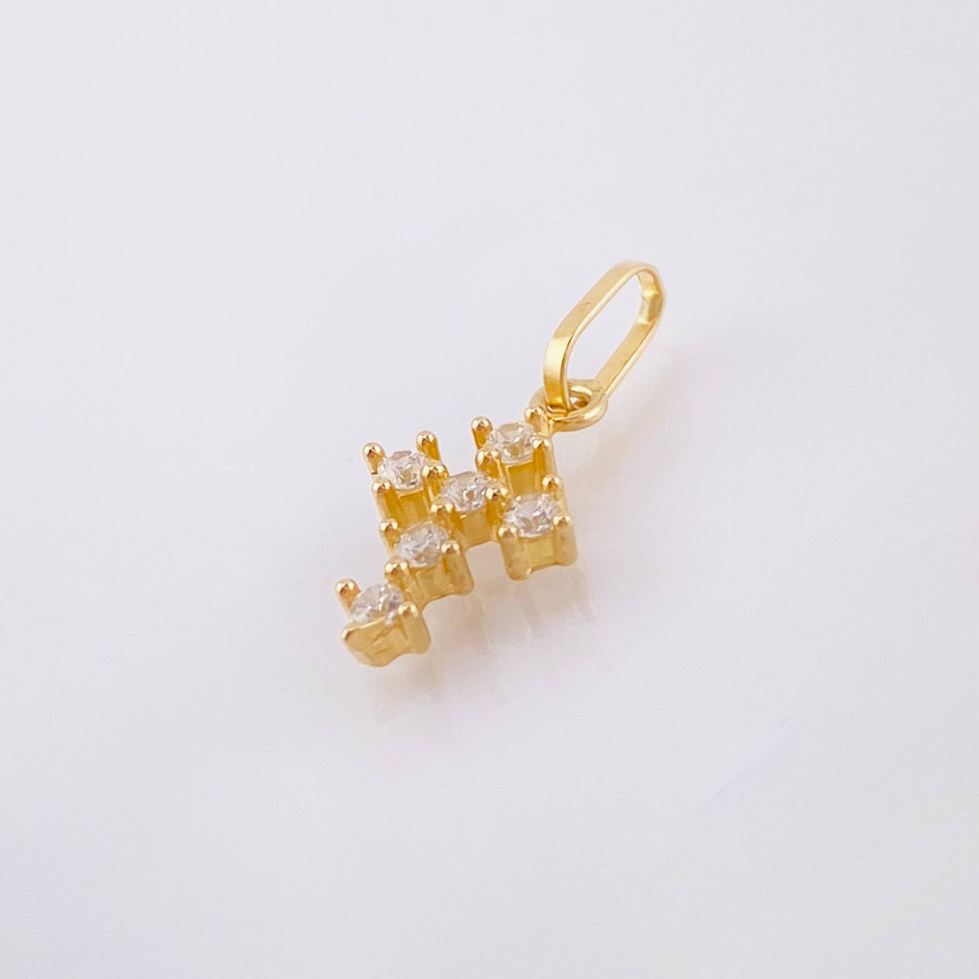 Dije Cruz Tupida 0.35gr / 1.5cm / Oro Amarillo 18K *