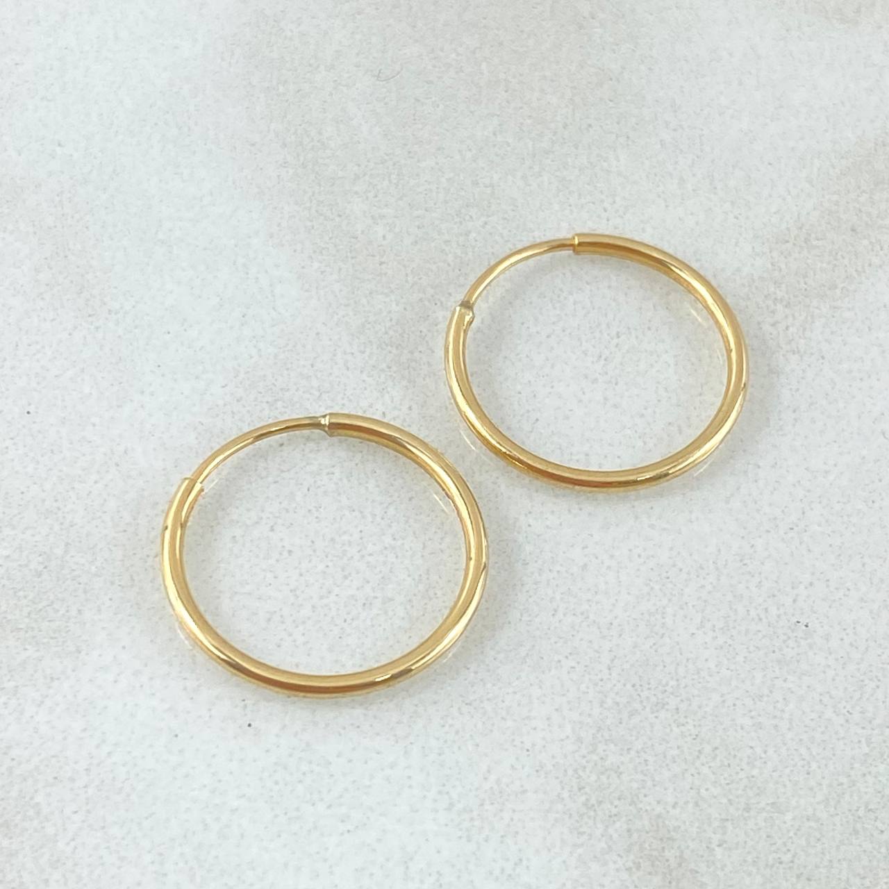 Candongas Mini Aro 0.6gr / 1.5cm / Oro 18K
