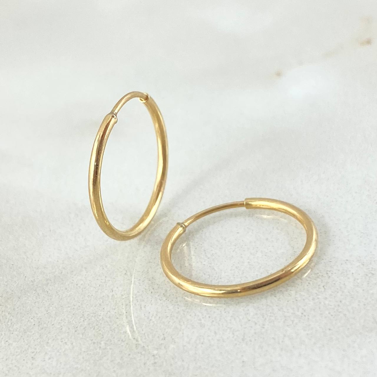 Candongas Mini Aro 0.6gr / 1.5cm / Oro 18K