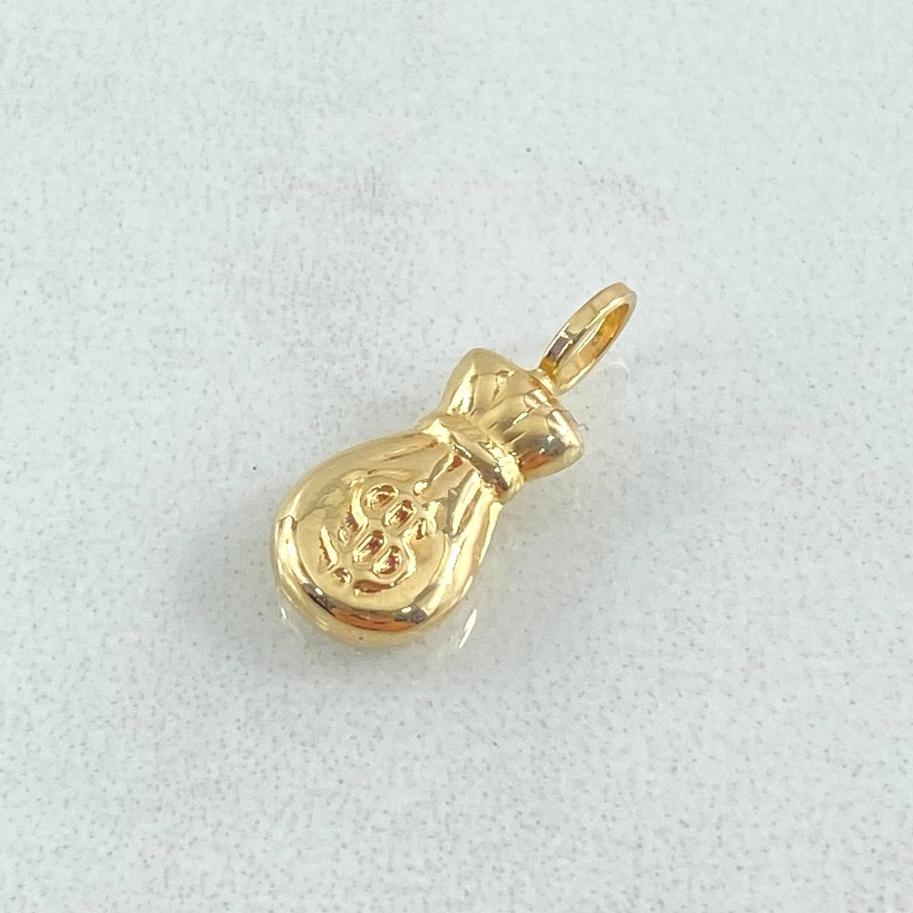 Dije Bolsa De Dinero 0.4gr / 1.6cm / Oro 18K ©