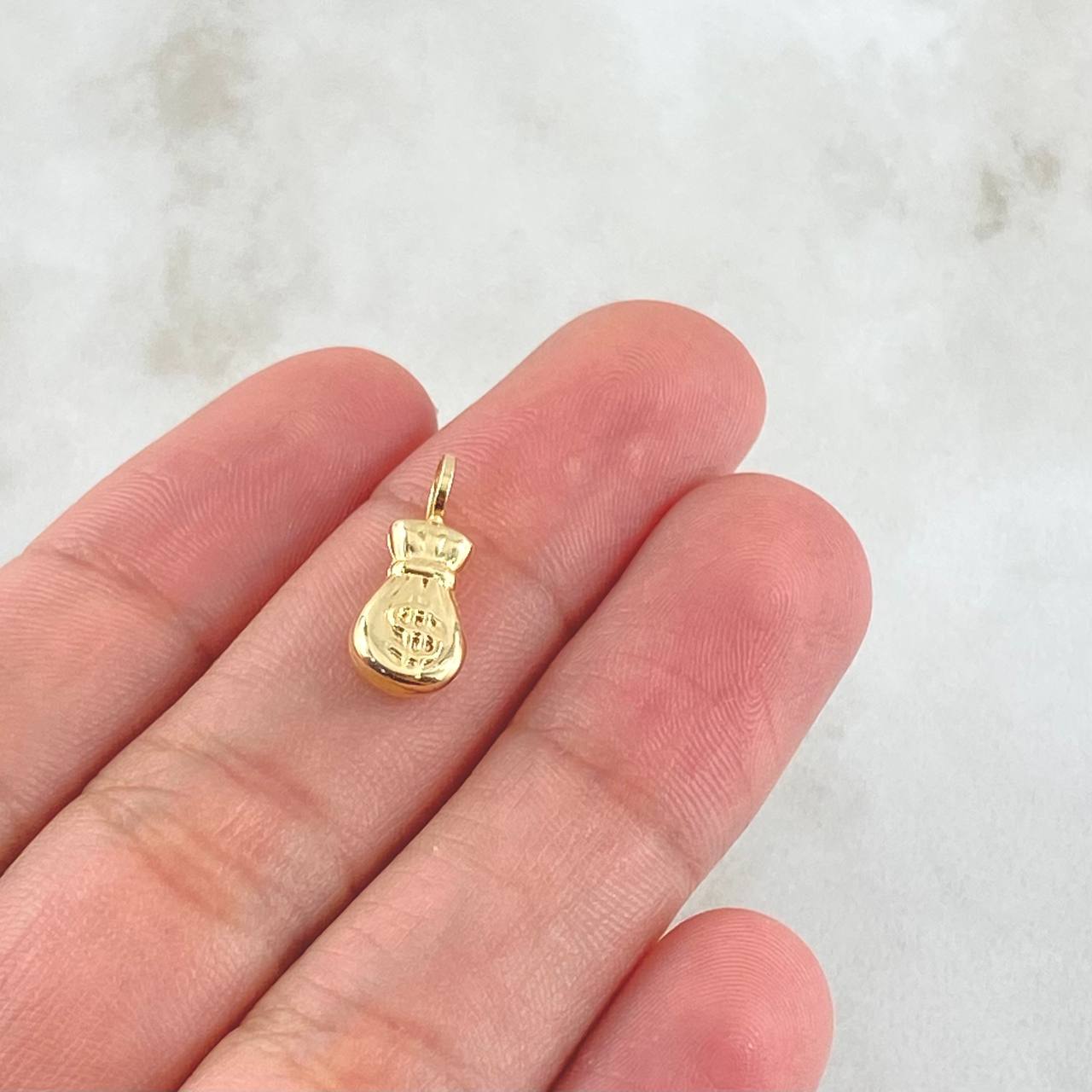 Dije Bolsa De Dinero 0.4gr / 1.6cm / Oro 18K ©