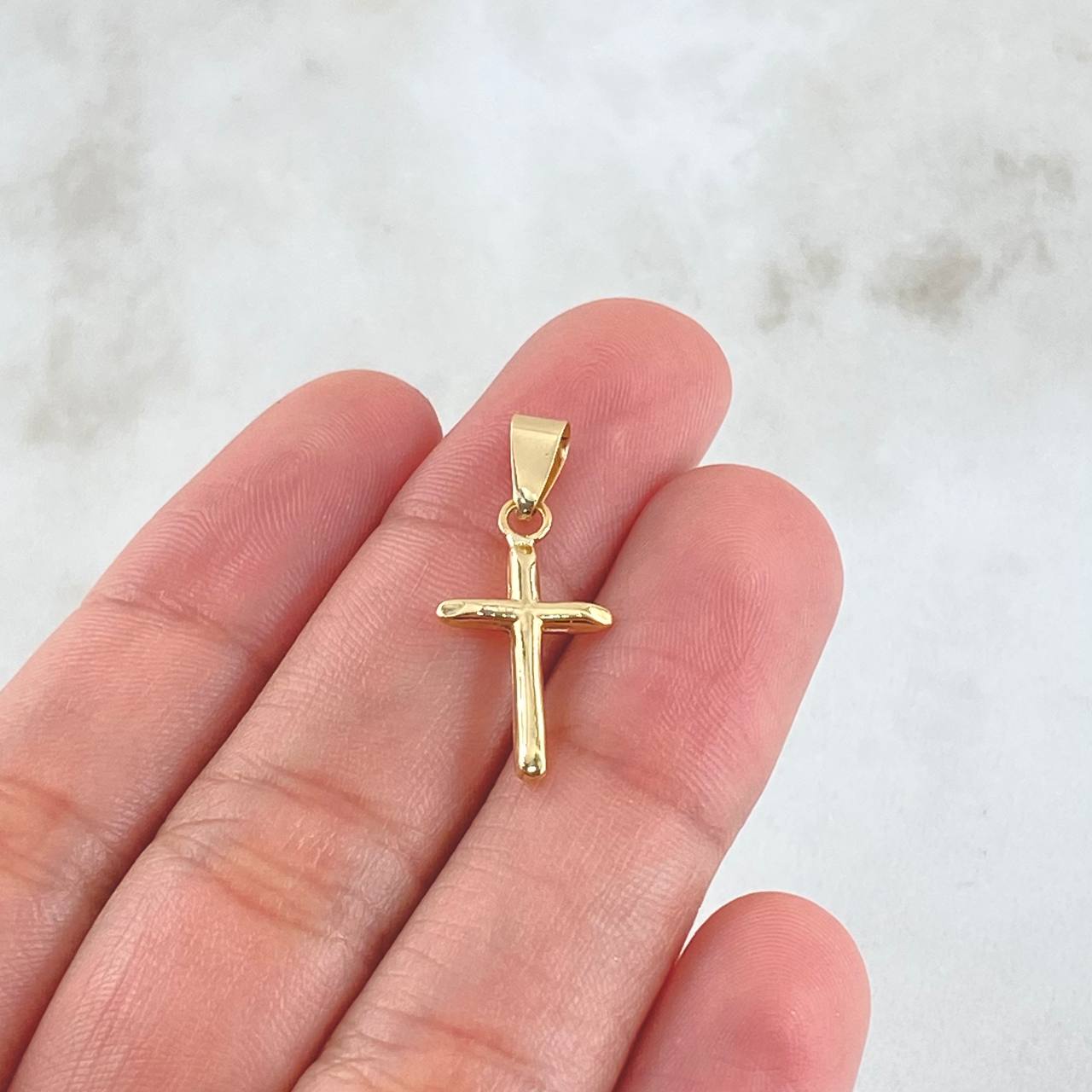 Dije Cruz 0.5gr / 2.6cm / Oro 18K ©