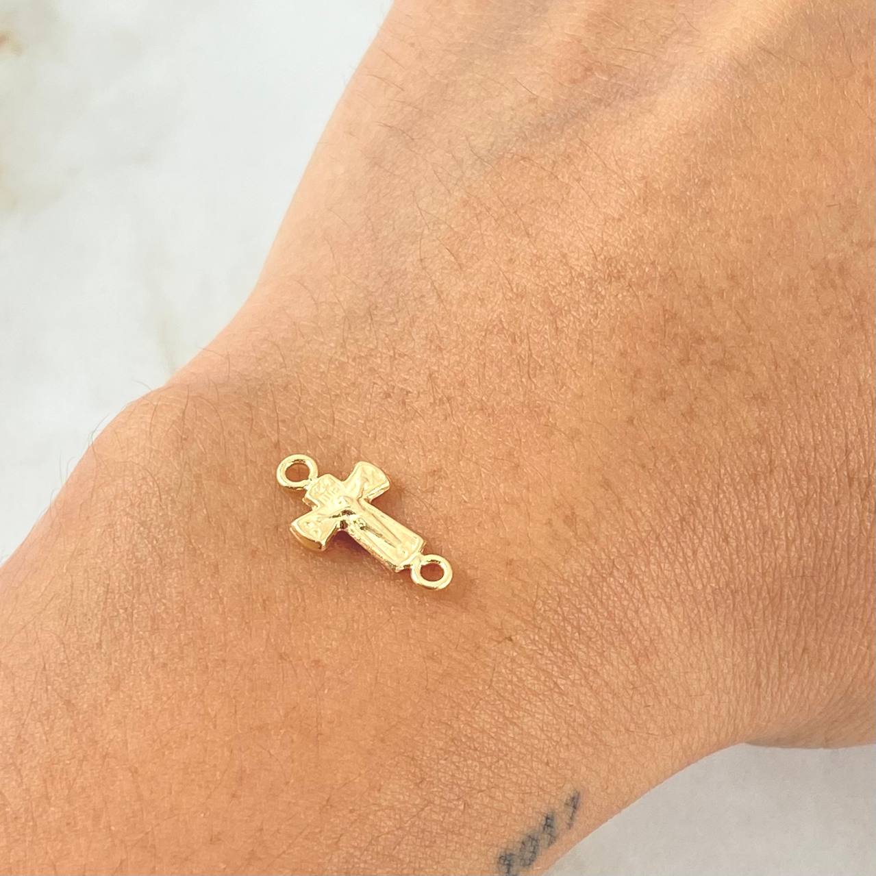 Herraje Cruz Cristo 0.4gr / 1.7cm / Oro 18K *