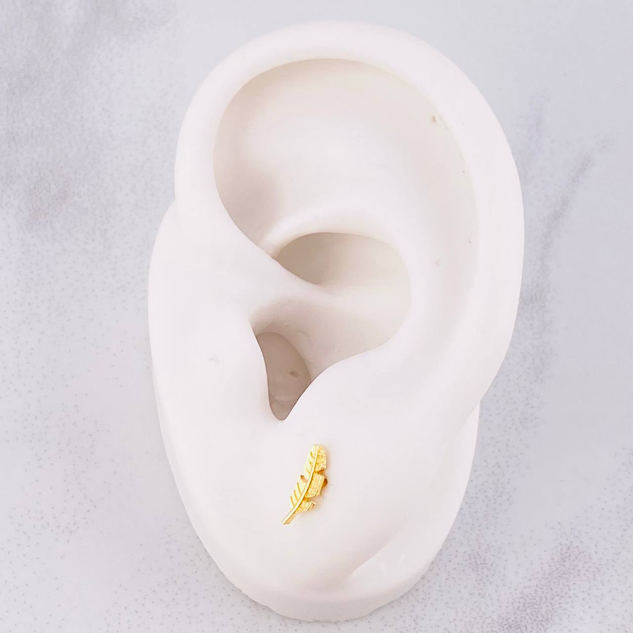 Topos Pluma 0.7g / 8.8mm Oro Amarillo 18K