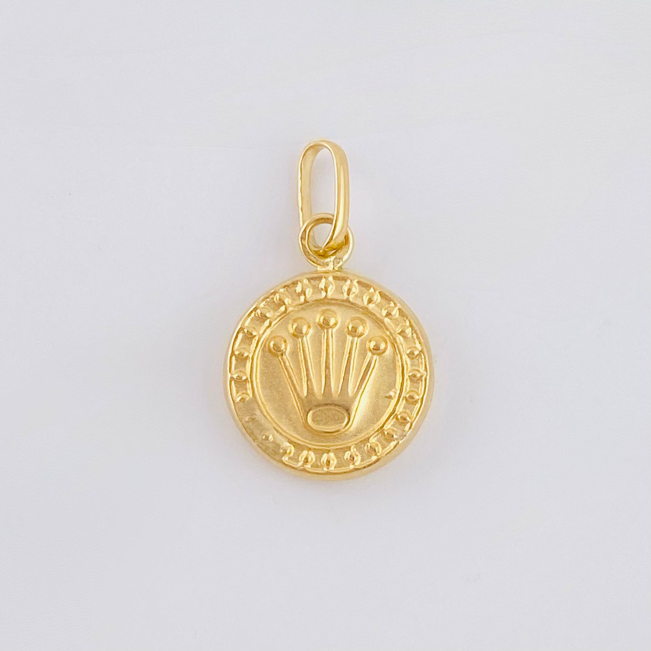 Dije Corona Rx 0.5gr / 1.5cm / Oro Amarillo 18K