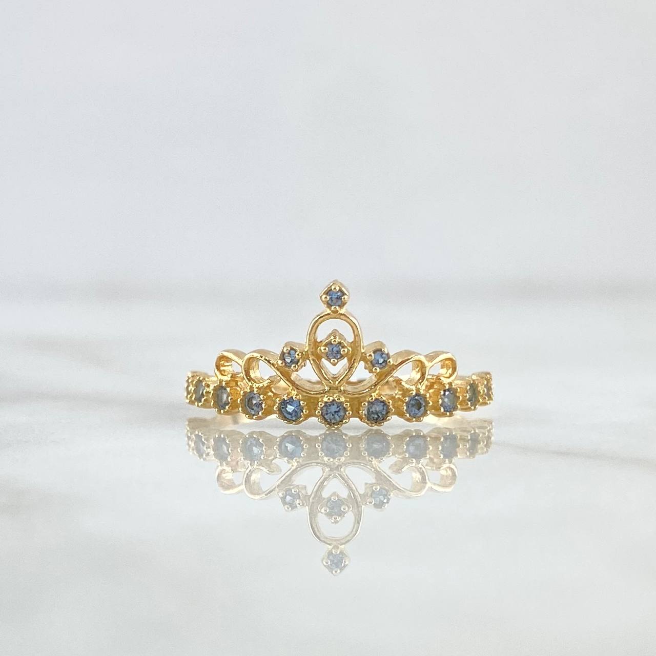 Anillo Corona Oleada 1.85gr / T7 1/2 / Circones Azul Celeste Oro Amarillo 18K ©