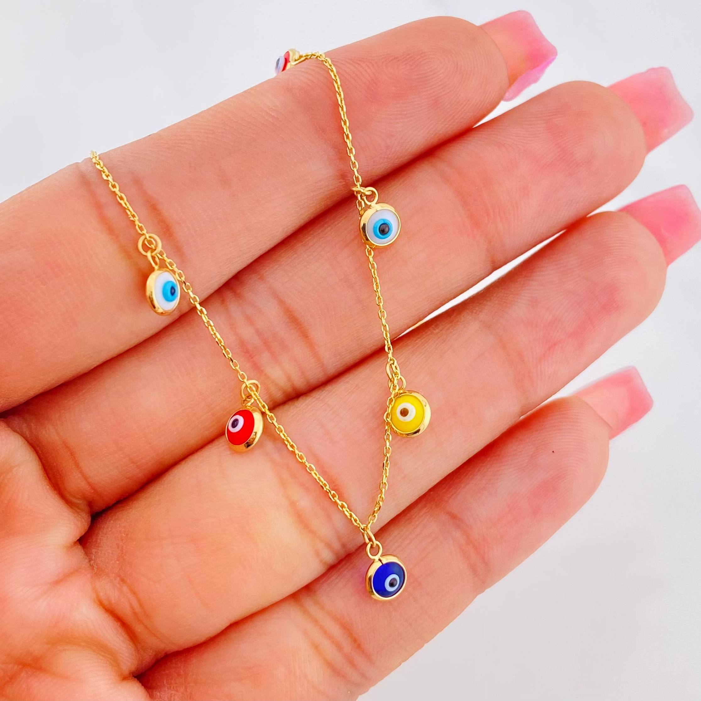 Cadena Aro Seguido Ojos Turcos 2.9g / 45cm / 0.75mm Oro Amarillo 18K