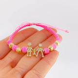 Pulsera Tejida Rosada Herraje Famlilia- Bolas 6Mm / 4 Und Oro Amarillo 18K