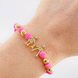 Pulsera Tejida Rosada Herraje Famlilia- Bolas 6Mm / 4 Und Oro Amarillo 18K