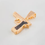 Dije Pistola 4.05g / 3cm Dos Oros Negro Rosa 18K