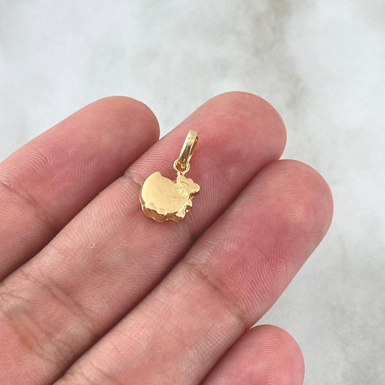 Dije Gallina 0.4gr / 1.5cm / Oro Amarillo 18K