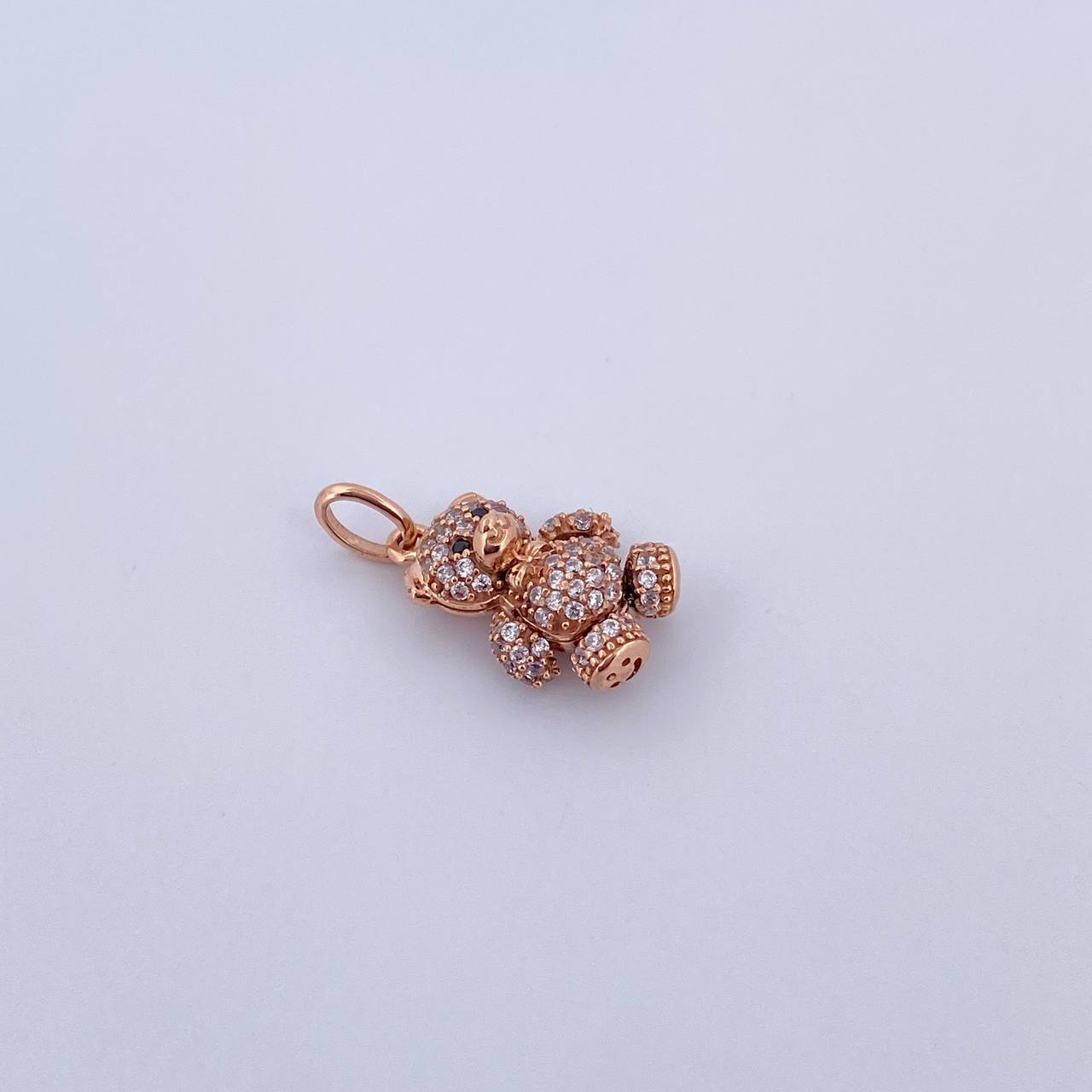 Dije Oso Articulado Mini 2.35gr / 2cm / Circones Negros Blancos Oro Rosa  18K $
