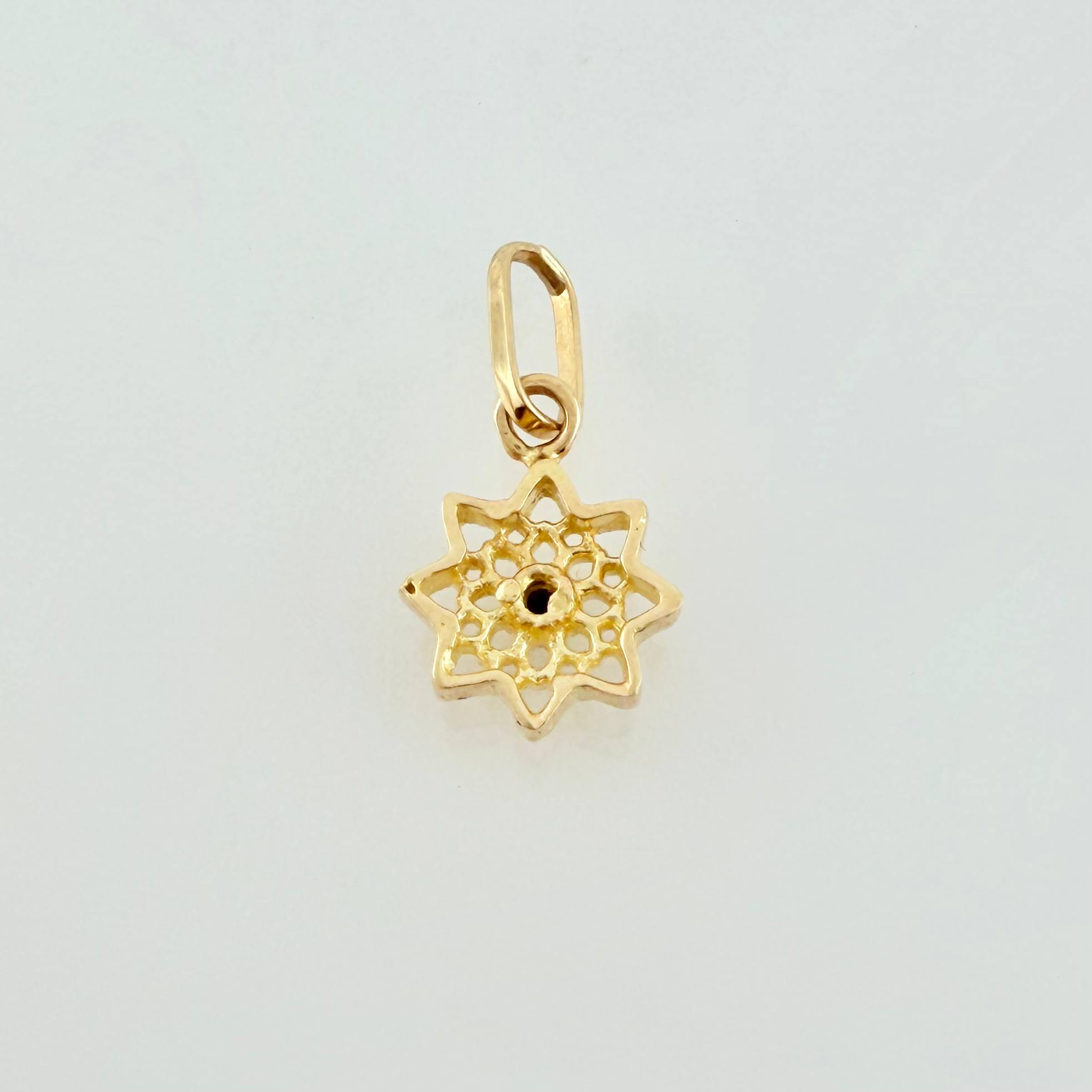 Dije Estrella 8 Puntas 0.45gr / 1.2cm / Oro Amarillo 18K