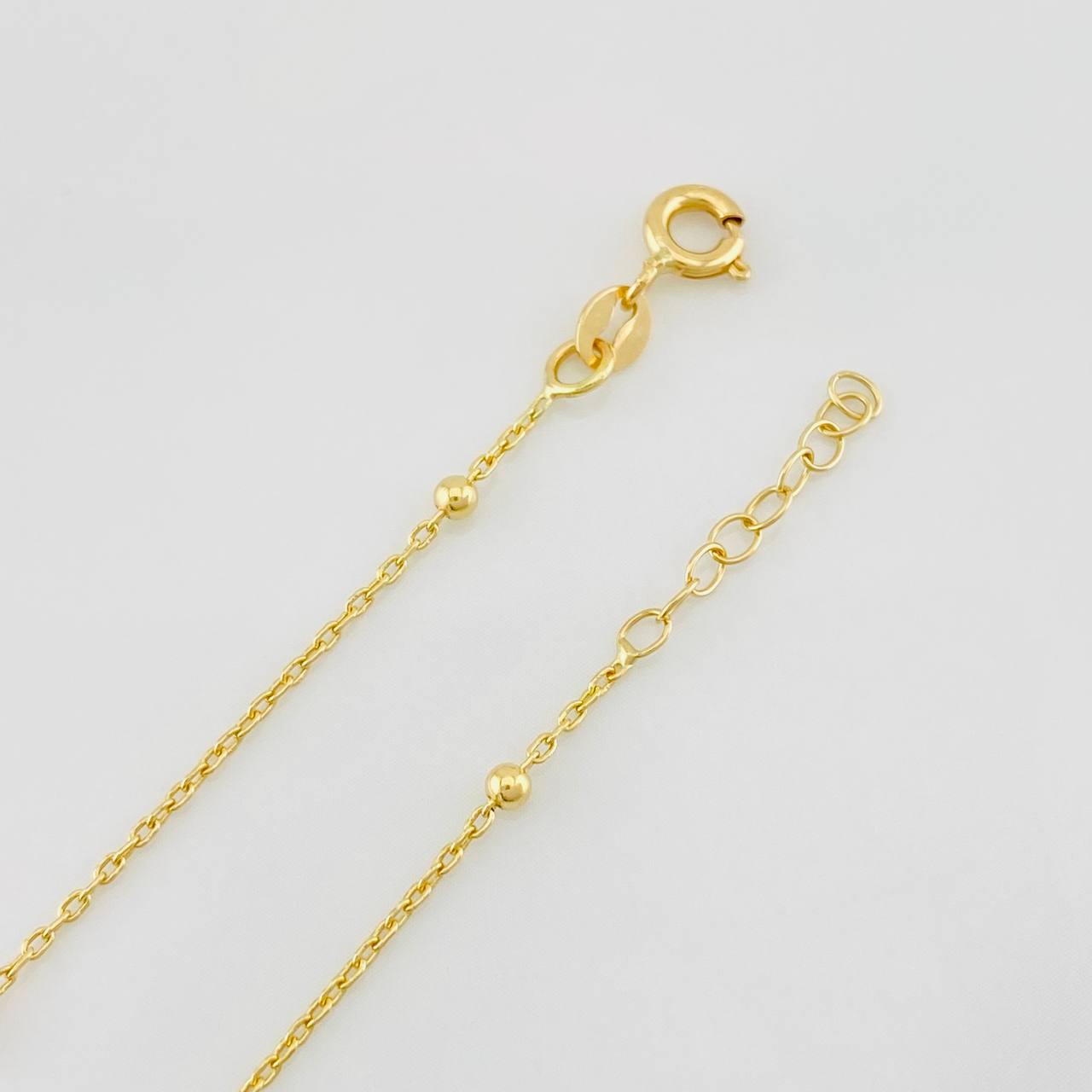 Tobillera Aro Seguido Bolas 1.3g / 22.5cm-24cm / 1mm Oro Amarillo 18K