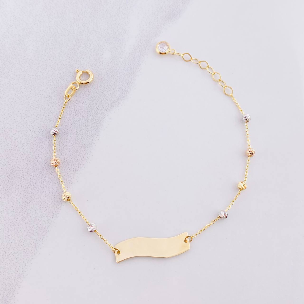 Pulso Bebé Placa Curva 1.45g / 13.3cm -15.3cm / 2.5mm Tres Oros18K