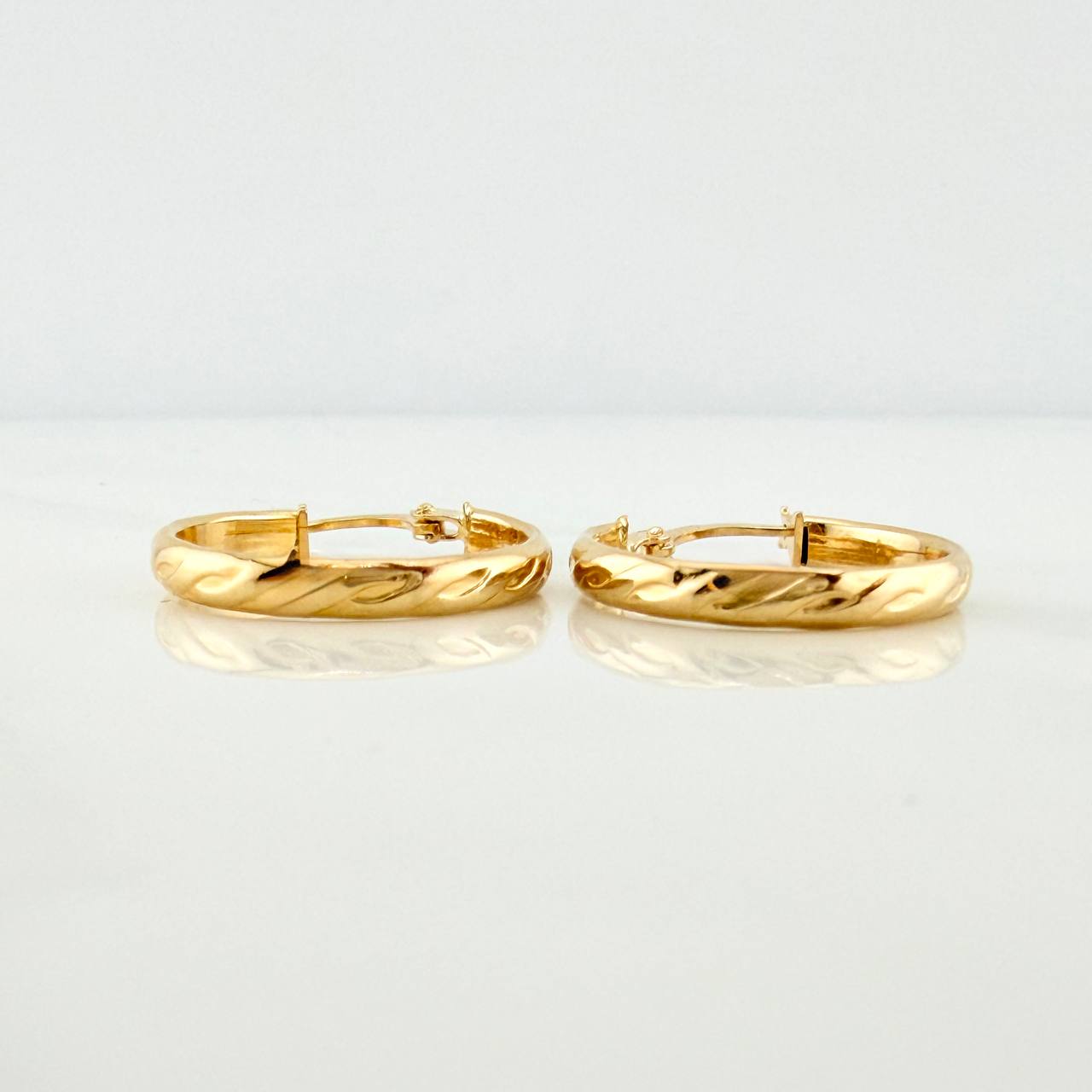 Candongas Lucero 1.4gr / 2cm / Oro Amarillo 18K %
