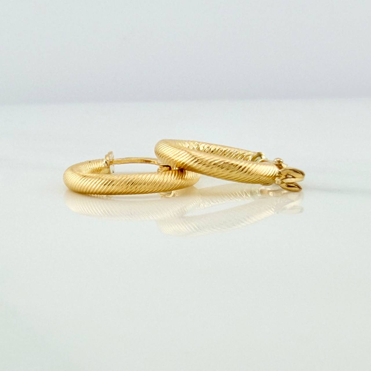 Candongas Zion 1.1gr / 1.5cm / Oro Amarillo 18K %