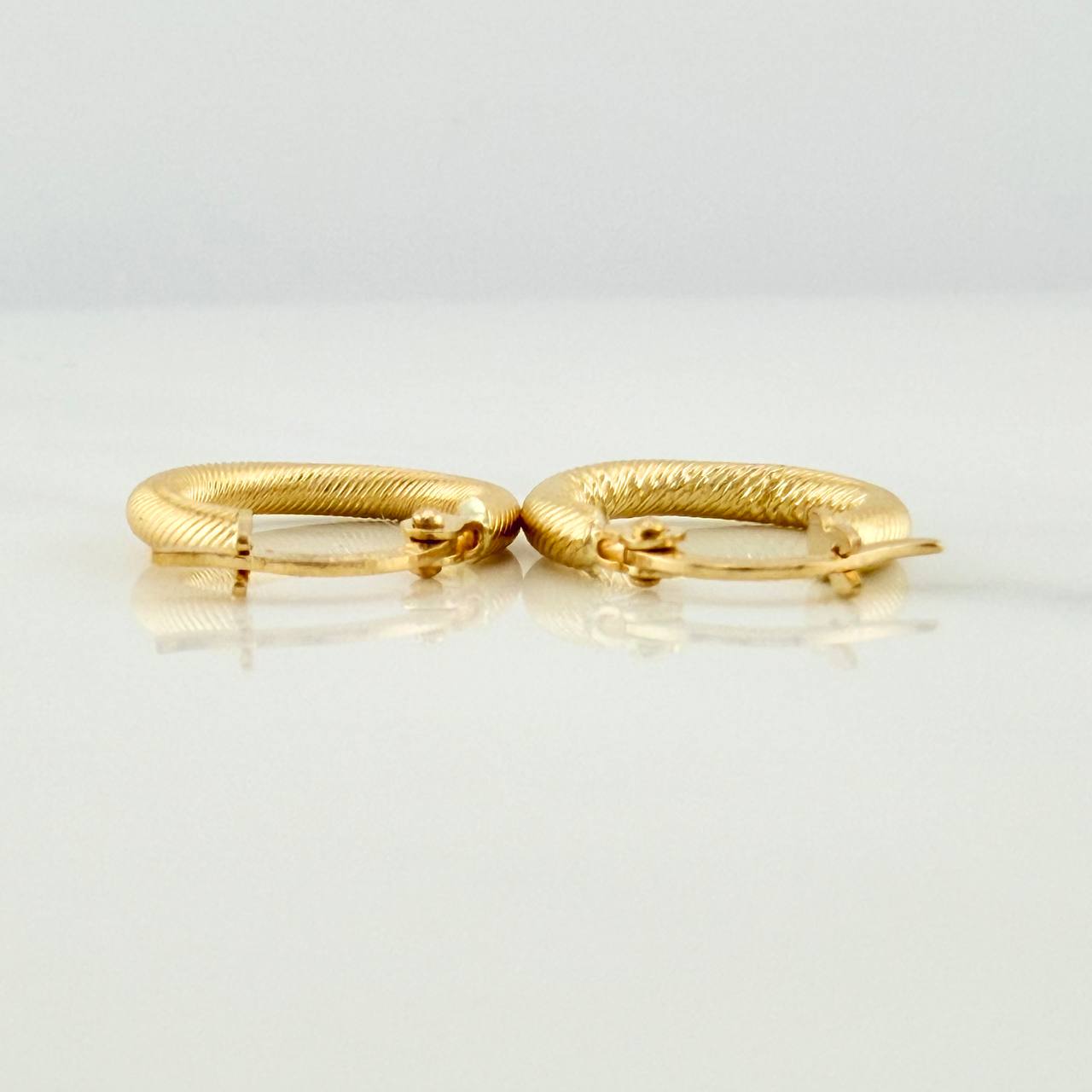 Candongas Zion 1.1gr / 1.5cm / Oro Amarillo 18K %
