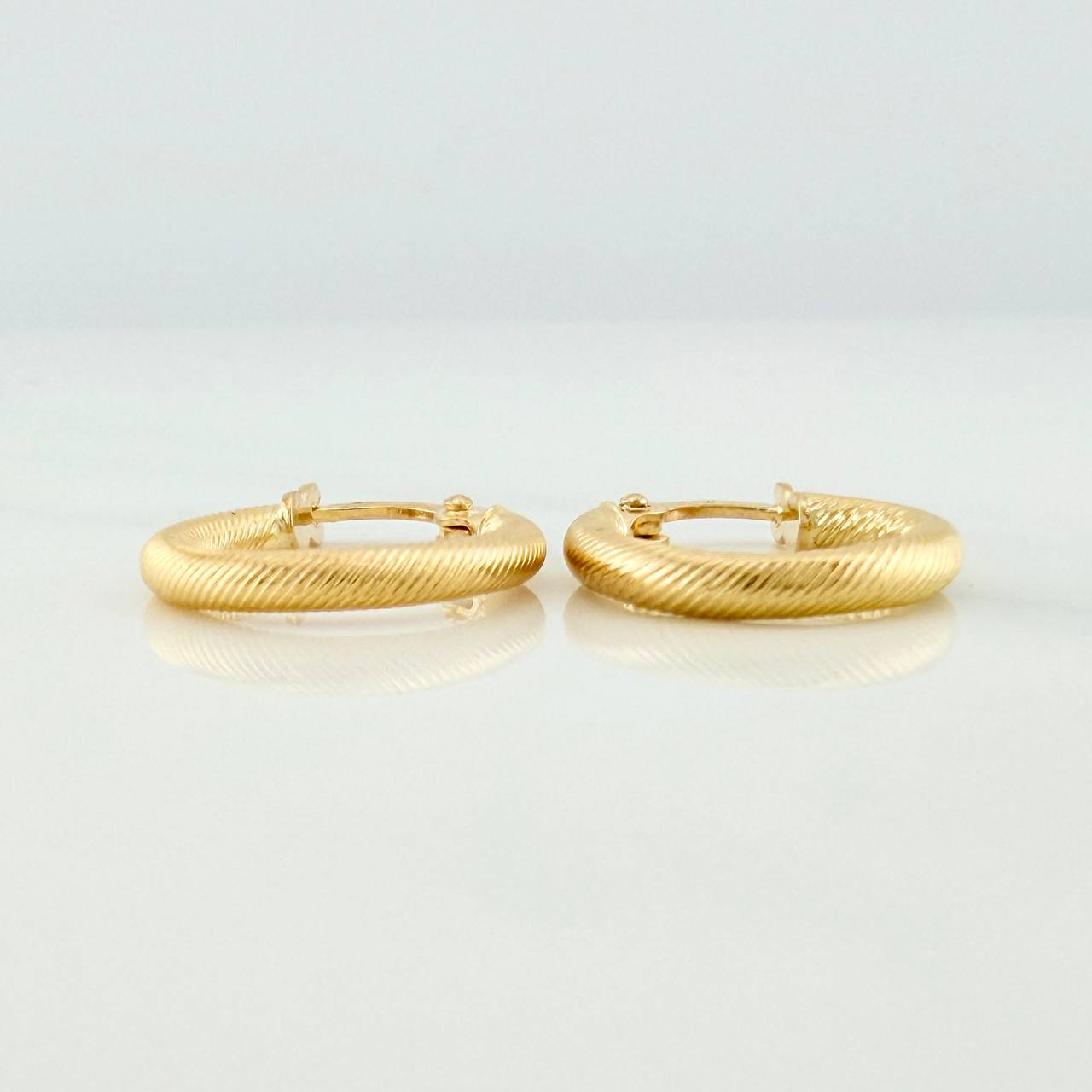 Candongas Zion 1.1gr / 1.5cm / Oro Amarillo 18K %