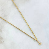Set Cadena Lazo 1.55gr / 60cm / 1.5mm + Dije Ancla 0.25gr / 1.5cm Lisa 1.8gr Oro Amarillo 18K (Oferta)