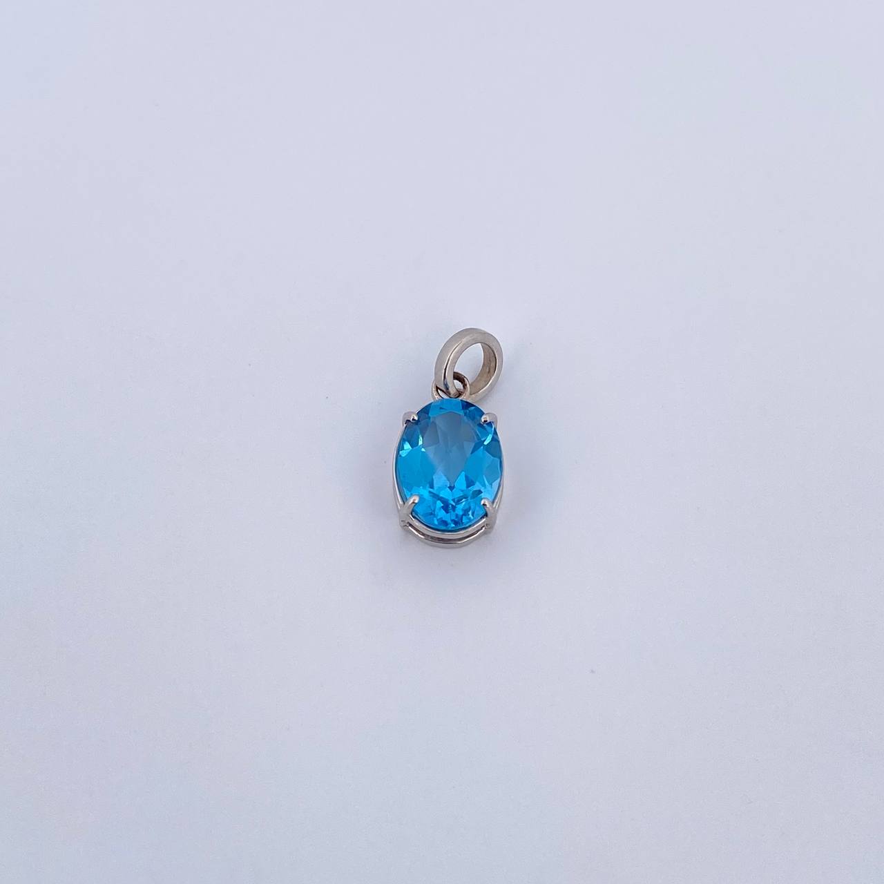 Dije Ovalo 0.95gr / 1.4cm / Circon Azul Oro Blanco 18K &