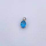 Dije Ovalo 0.95gr / 1.4cm / Circon Azul Oro Blanco 18K &