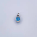 Dije Ovalo 0.95gr / 1.4cm / Circon Azul Oro Blanco 18K &